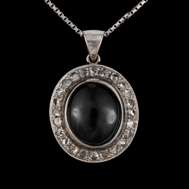 A sapphire and rose-cut diamond pendant.