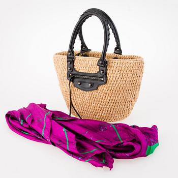 BALENCIAGA Panier leather-trimmed woven raffia tote with a silk scarf.