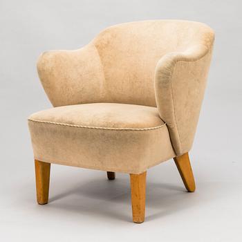 FLEMMING LASSEN, an armchair manufactured by Asko 1952-1956.