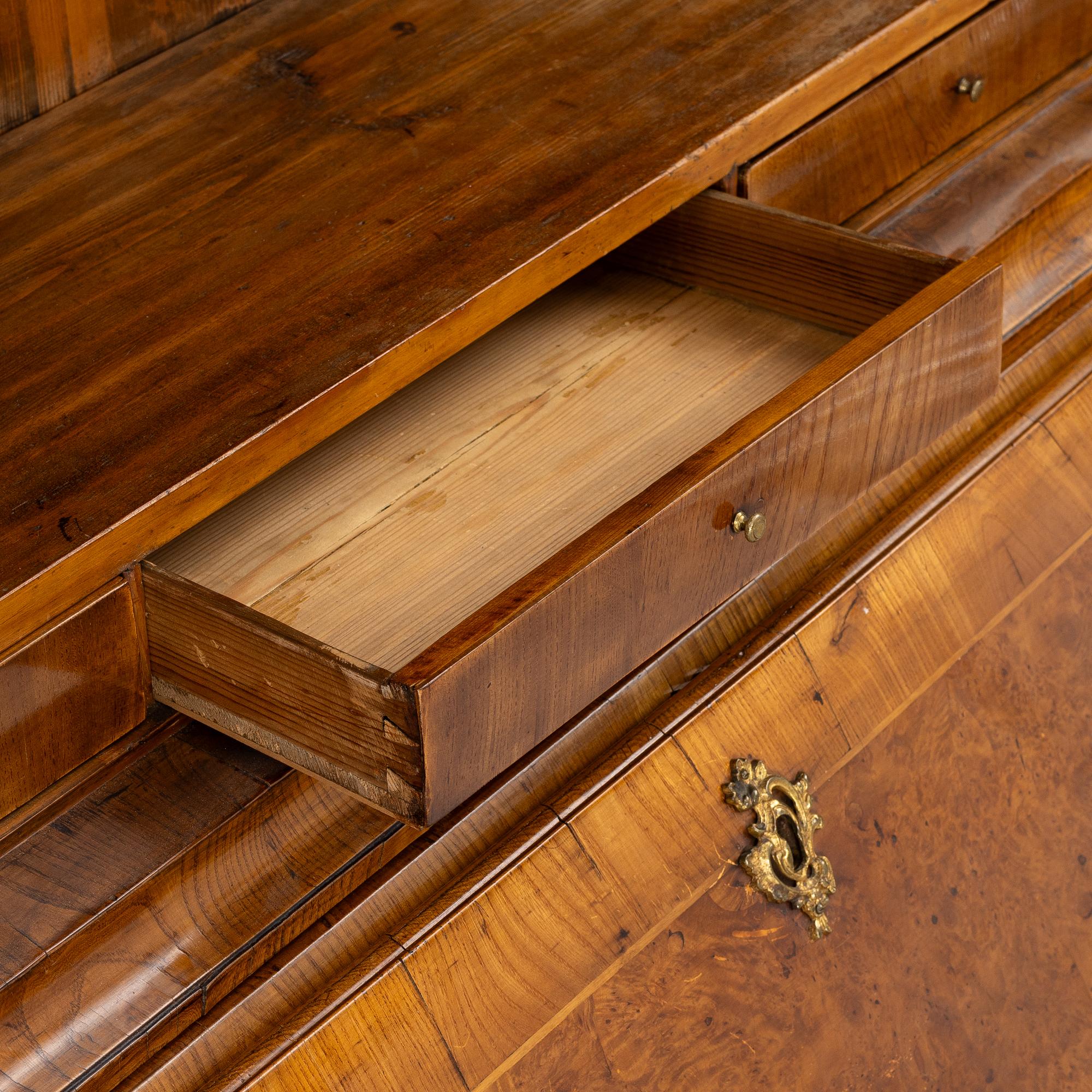 A Swedish rococo burr-alder veneered cabinet, later part 18th century.