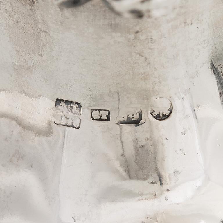 A pair of silver candelabra, maker marks of Carl Johan Tegelsten, Saint Petersburg 1850.