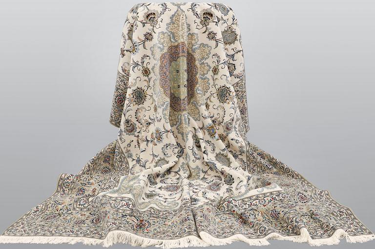 A signed so called Royal Kashan carpet, ca 432 x 313 cm.