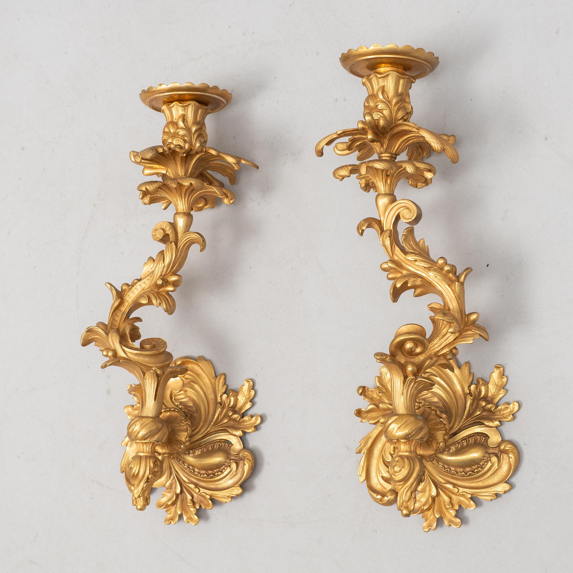 A pair of Louis XV sconces, early 20th century.