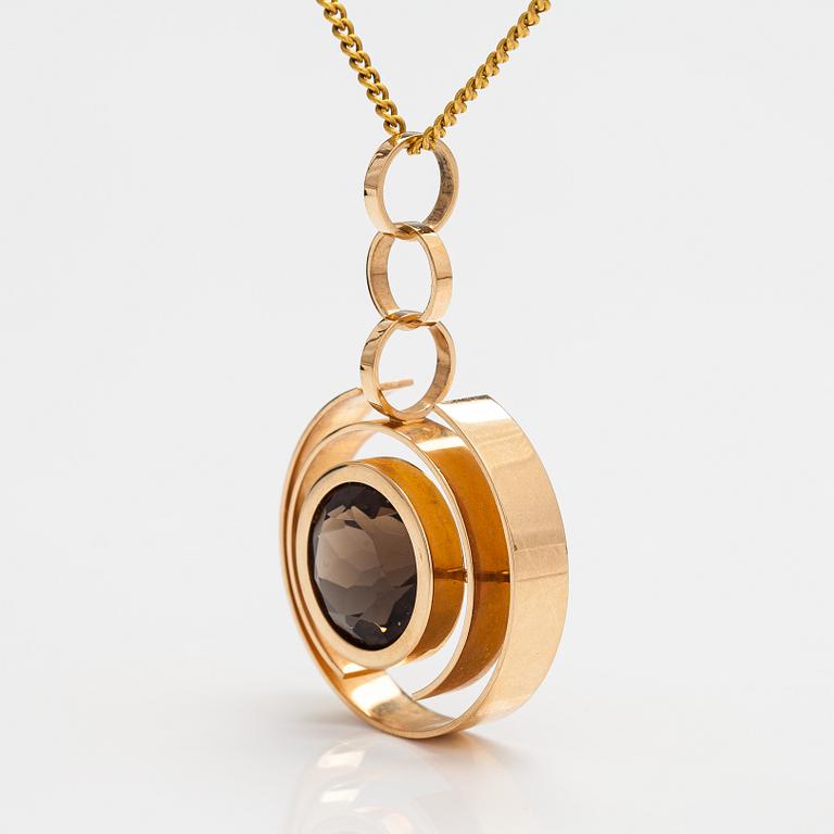 Elis Kauppi, A 14K gold and smoky quartz necklace. Kupittaan kulta, Turku 1965.