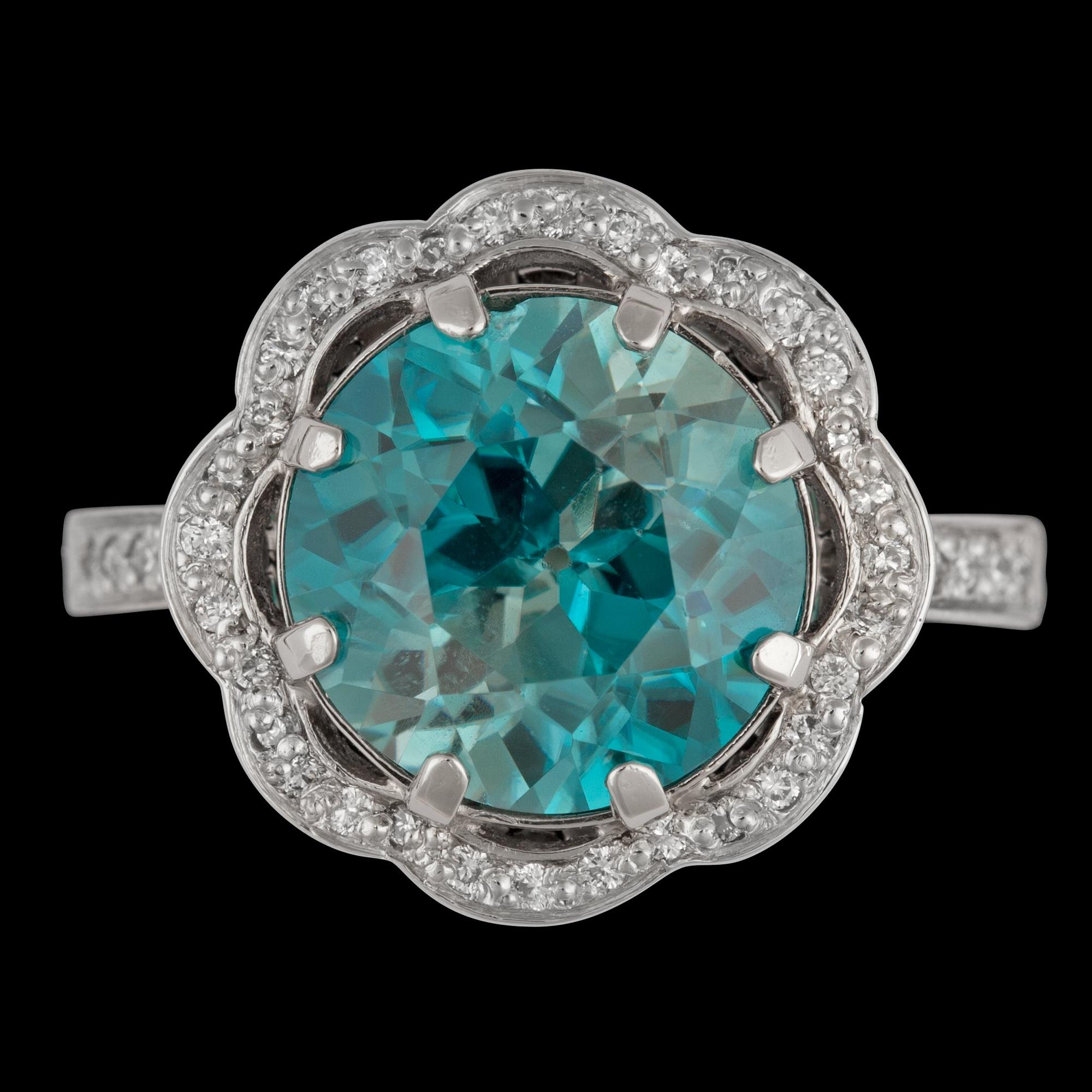 A blue zircon and brilliant cut diamond ring.