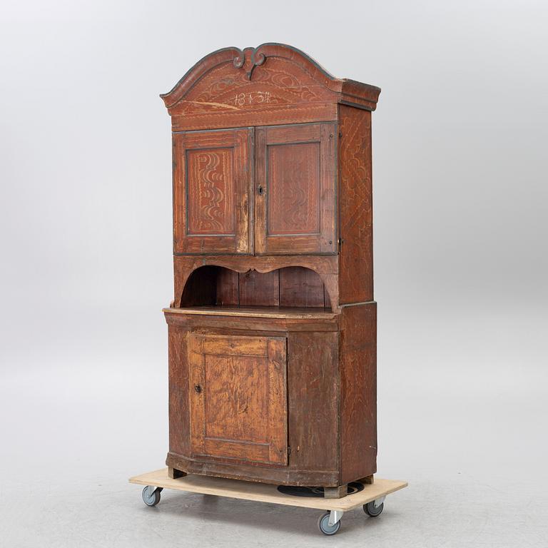 A 19th century Folk art gift cabinet.