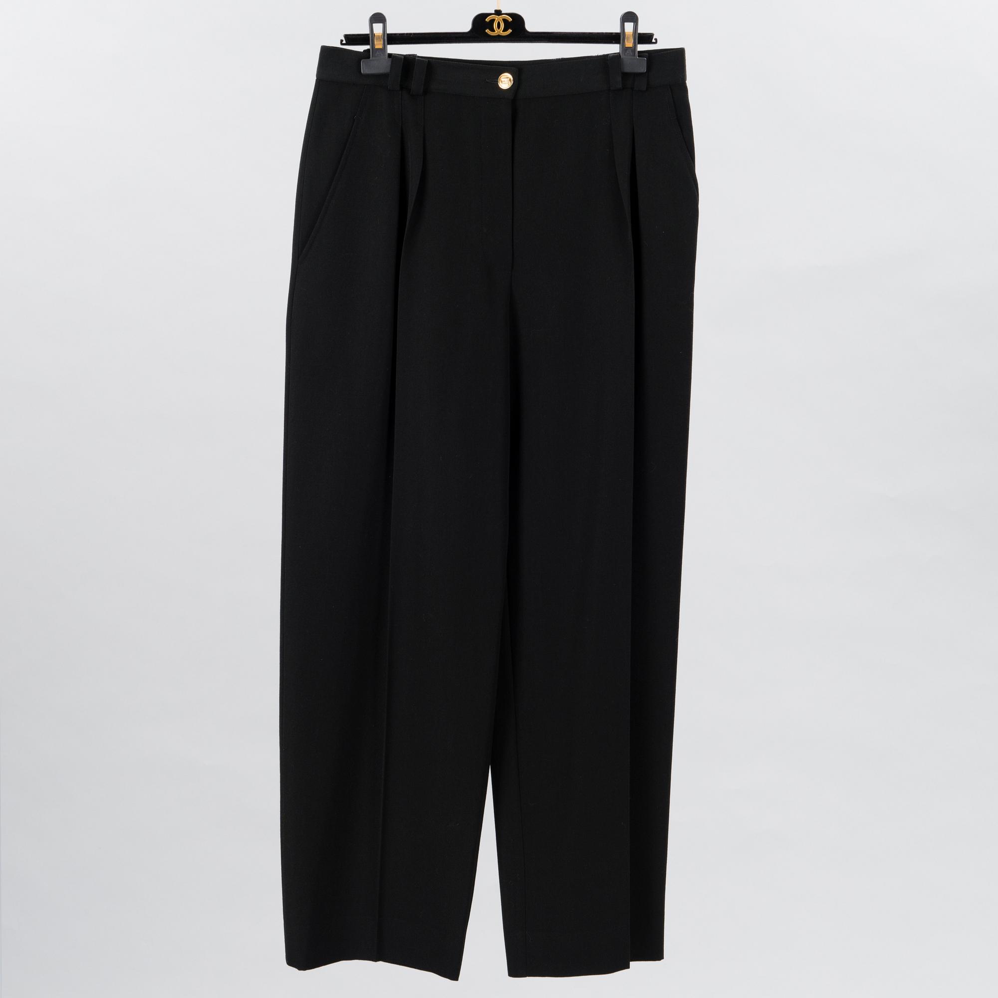 SKIRT AND A PAIR OF TROUSERS.