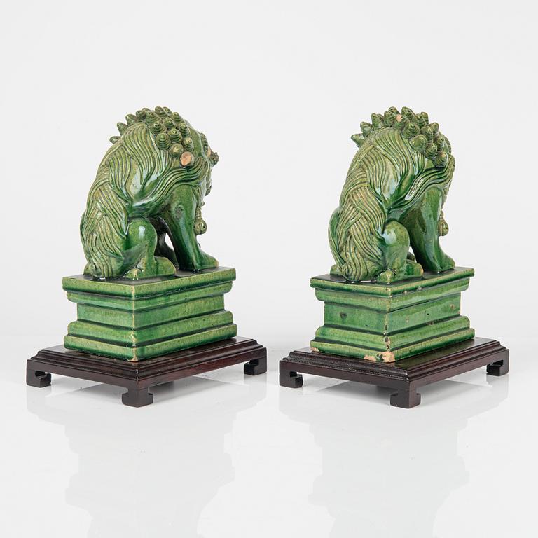 A pair of green glazed figures of mythical beasts, Ming style, China, 20th Century.