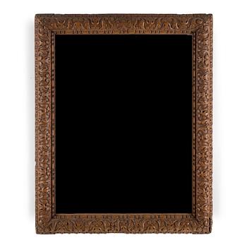 AN 18TH CENTURY OAK PICTURE FRAME.