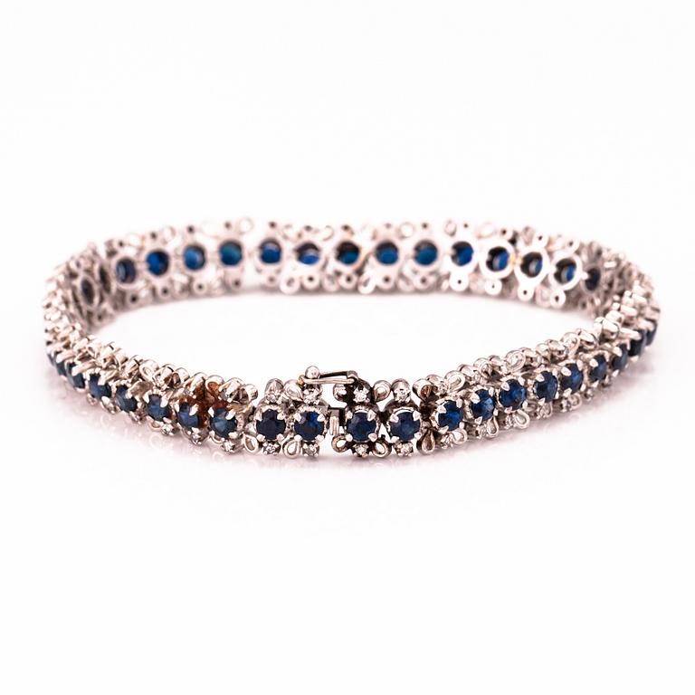 A white gold bracelet with sapphires and 8/8 cut diamonds ca. 0.75 ct in total.