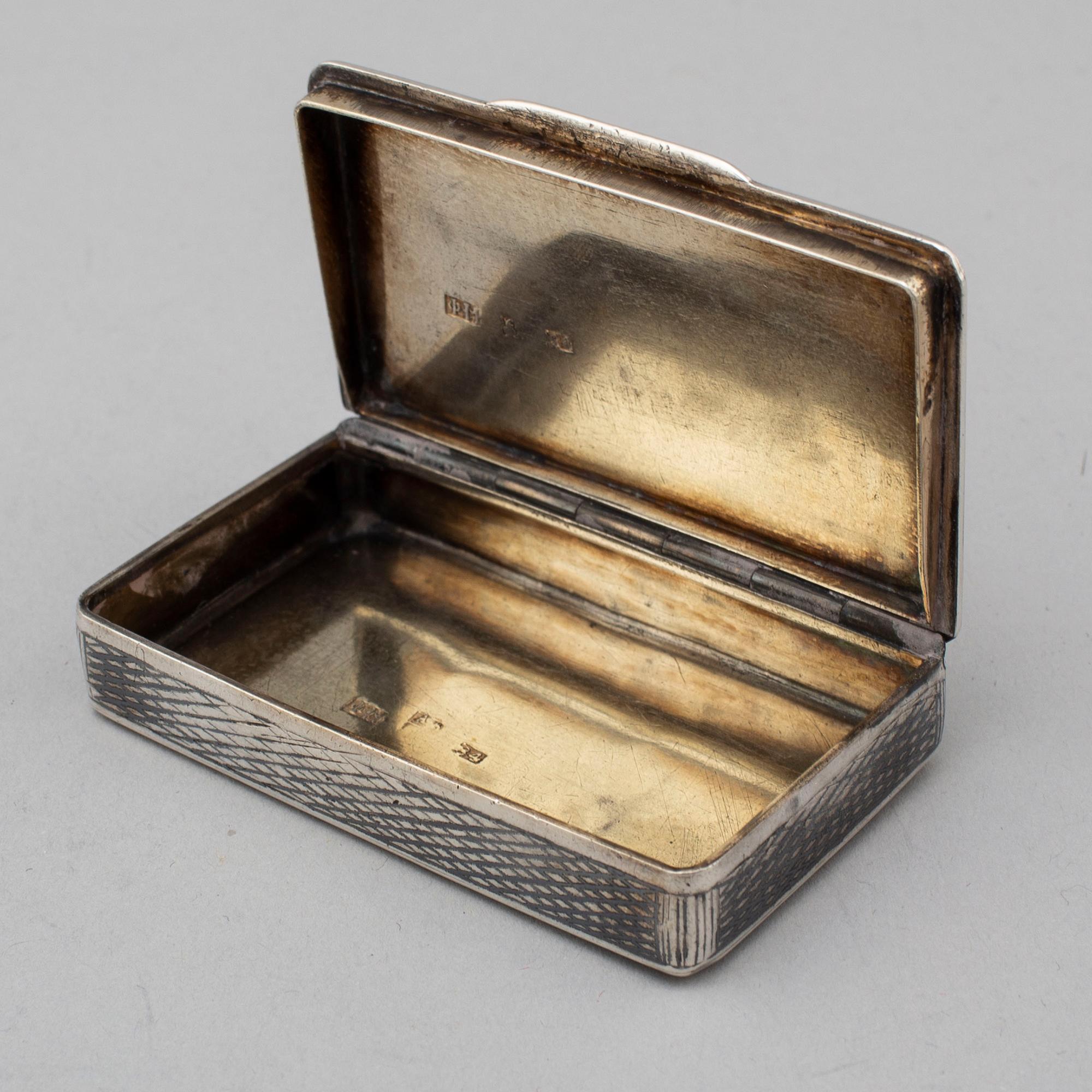 A Russian 19th century parcel-gilt silver and niello snuff box, mark possibly of Fyedor Maksomov, Moscow.