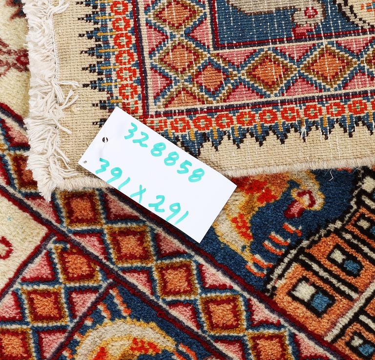 A Kashmar carpet, c. 391 x 291 cm.