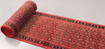 A Hosseinabad runner, approx. 1360 x 80 cm.