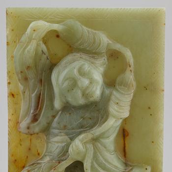 A Chinese green stone sculpture, 20th century.