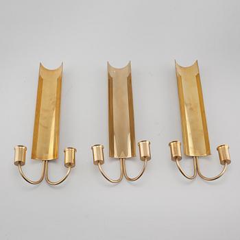 Three wall candle holders from Skultuna, model "Reflex", second half of the 20th century.