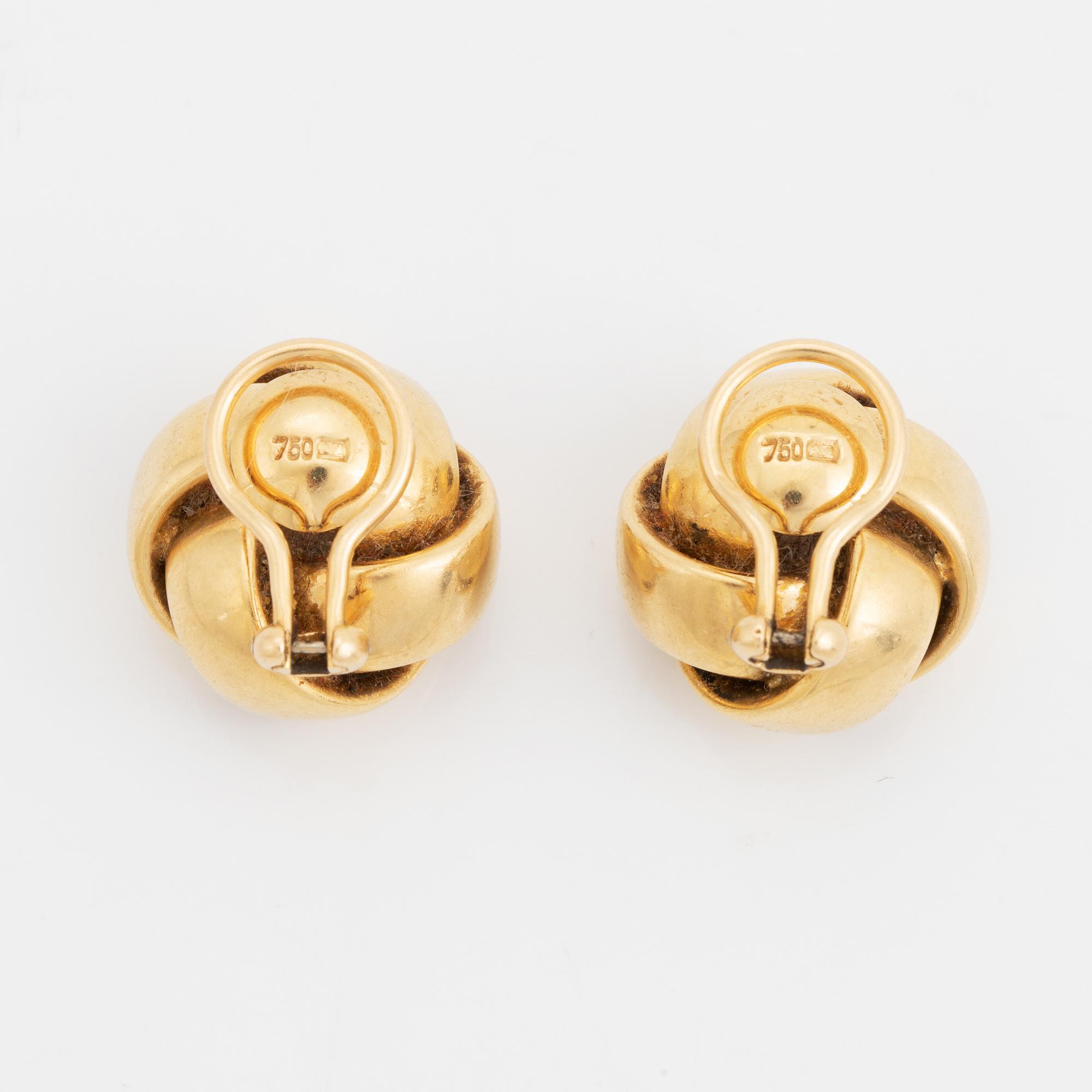 18K gold clip earrings.