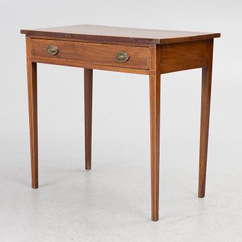 A table, England, circa 1900.