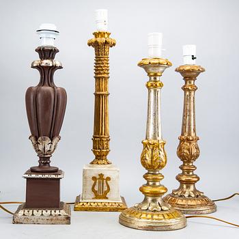 Four mid 20th century wood table lamps from Paoletti, Firenze Italy.