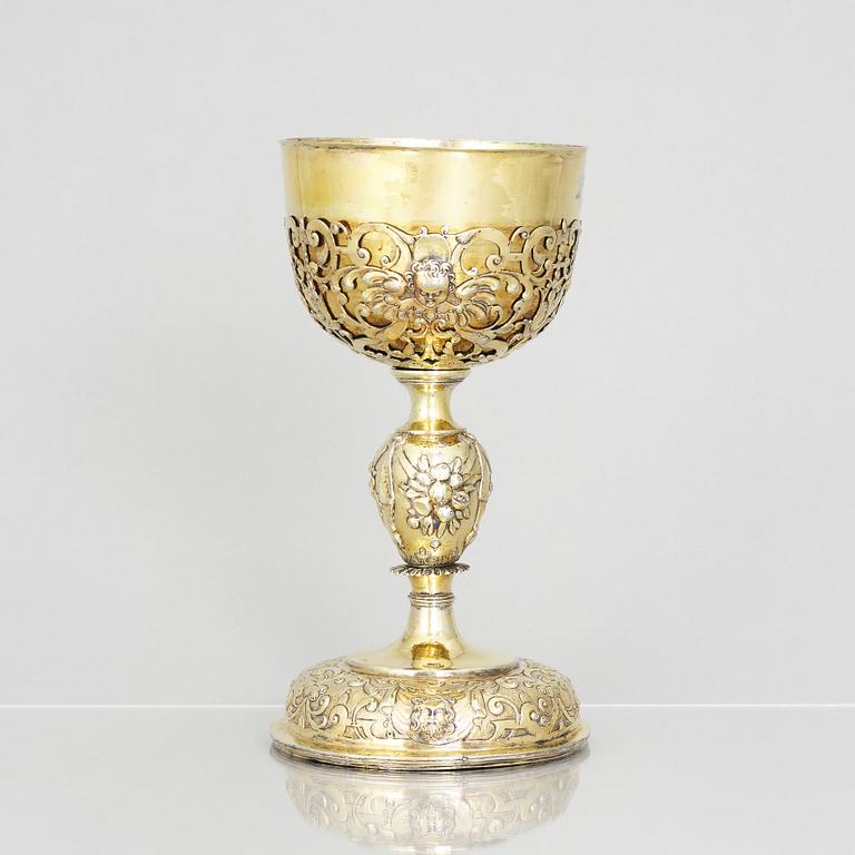 A 17th century silver-gilt cup, marked GM.