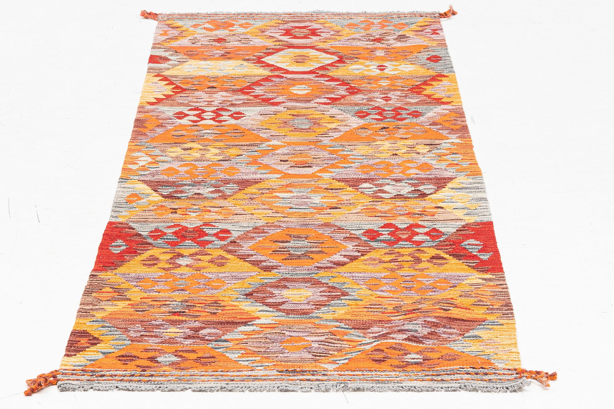 A Kilim runner, c. 255 x 85 cm.