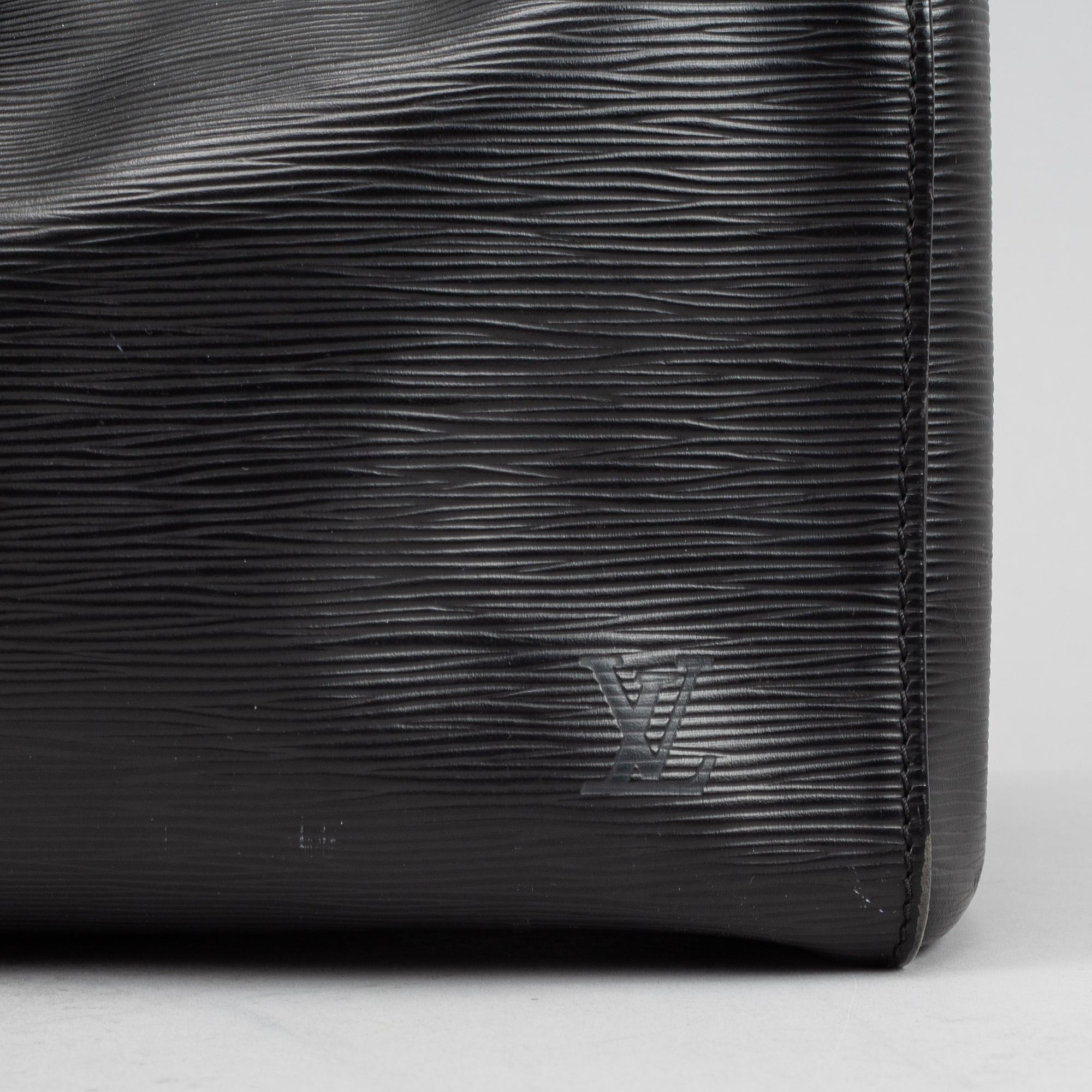 Louis Vuitton, a black Epi 'Keepall 50' weekend bag.