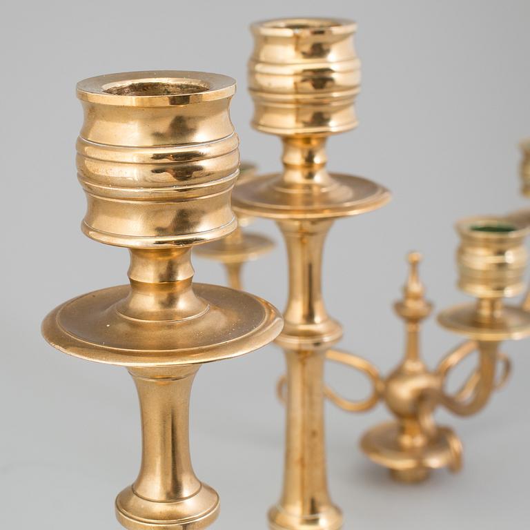 A pair of Candelabra, in brass Westerås Metallfabriks AB, late 19th century.