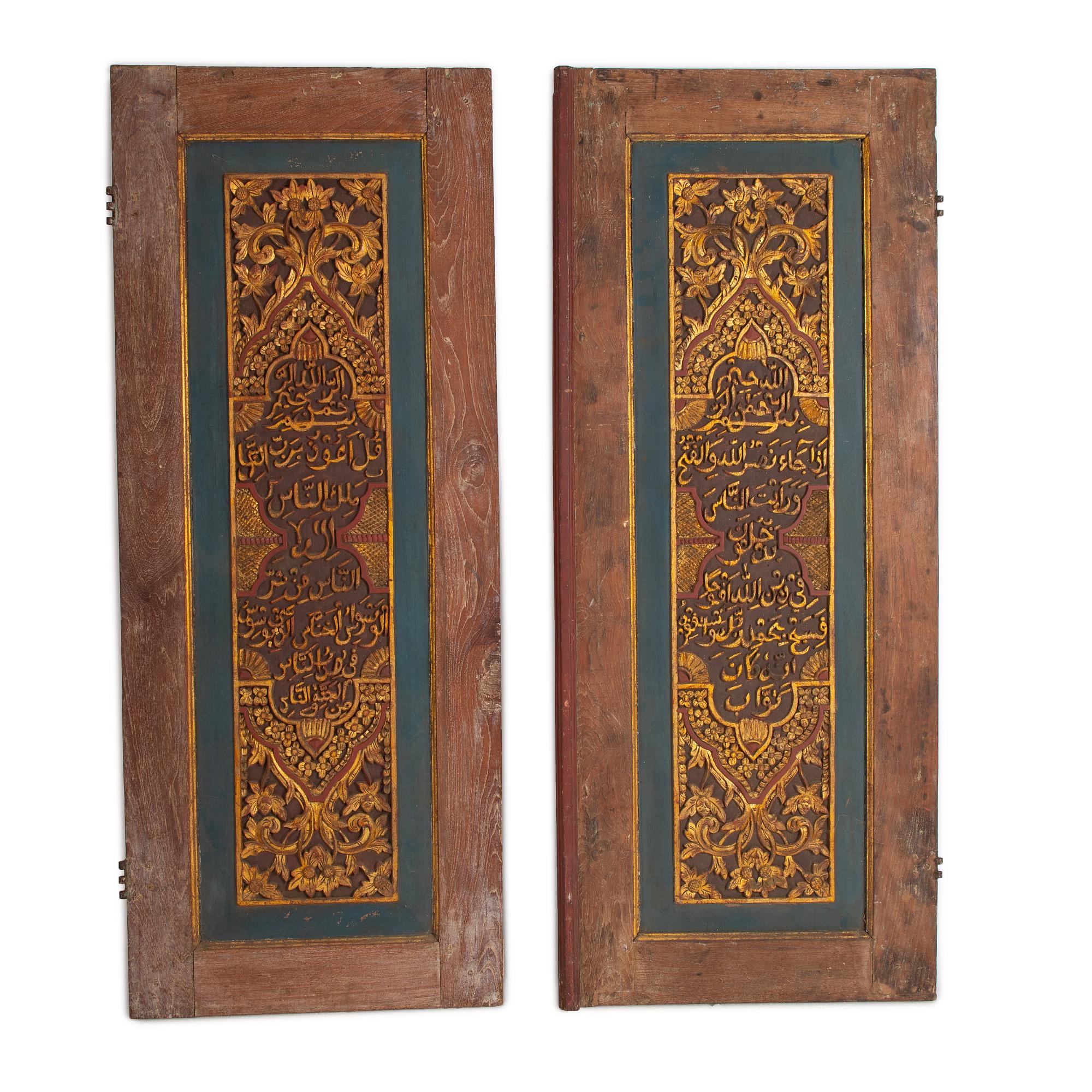 A pair of South East Asian carved wooden doors, presumably Java, 19th Century.