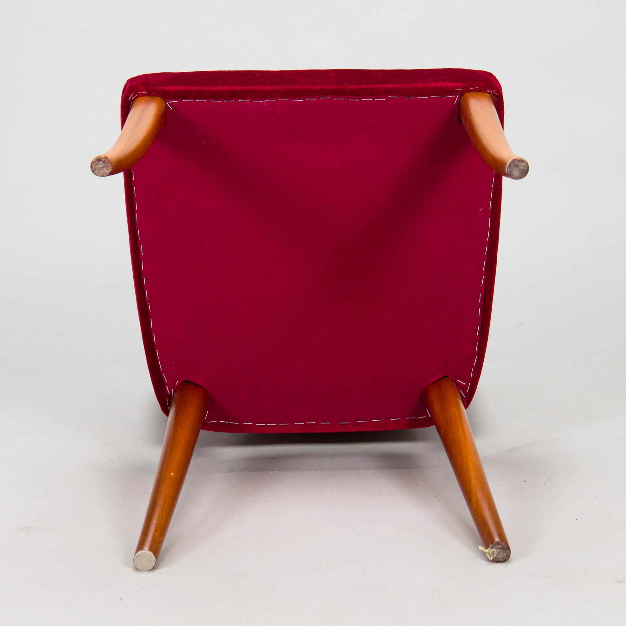 A mid 20th century dining table and a set of four chairs, Oy Boman Ab and two chairs Werner West.