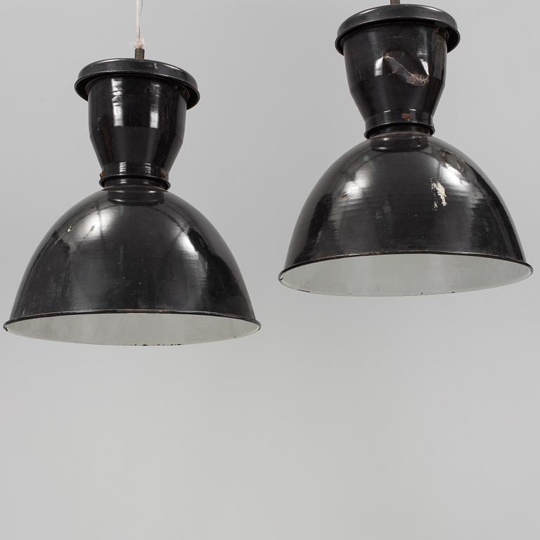 a pair of mid 20th century metal ceiling lights.