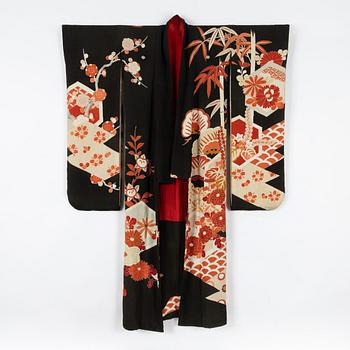 A painted and embroidered silk kimono. Japan, 20th century.