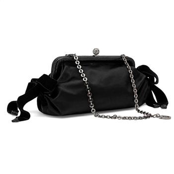 523. SALVATORE FERRAGAMO, a black silk evening bag.