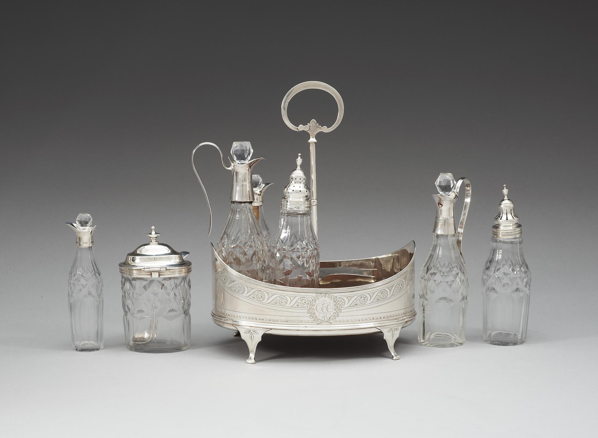 An English 18th century silver and glass cruet-set, unidentified makers mark, London 1797.