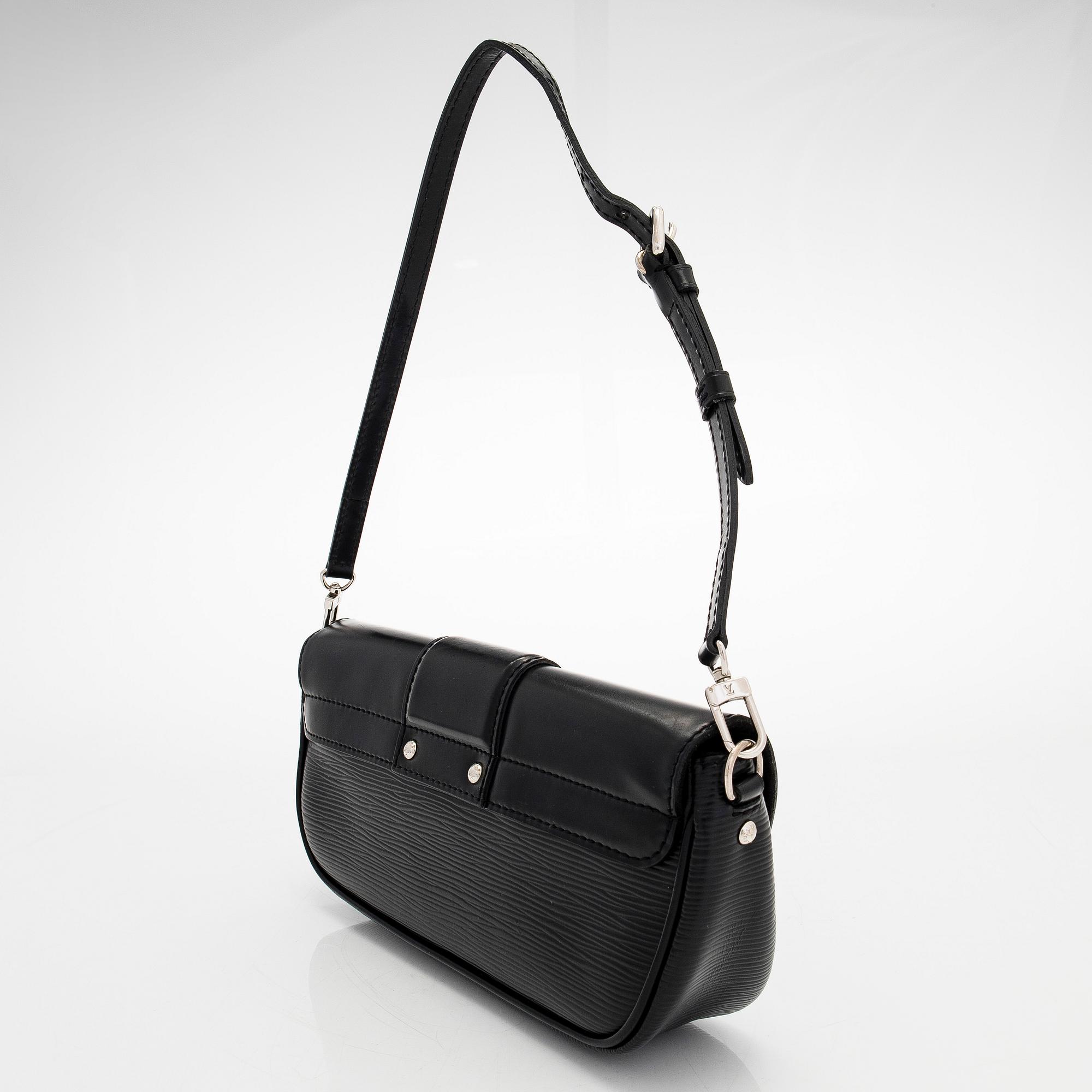 Louis Vuitton, a 'Pochette Montaigne' bag.