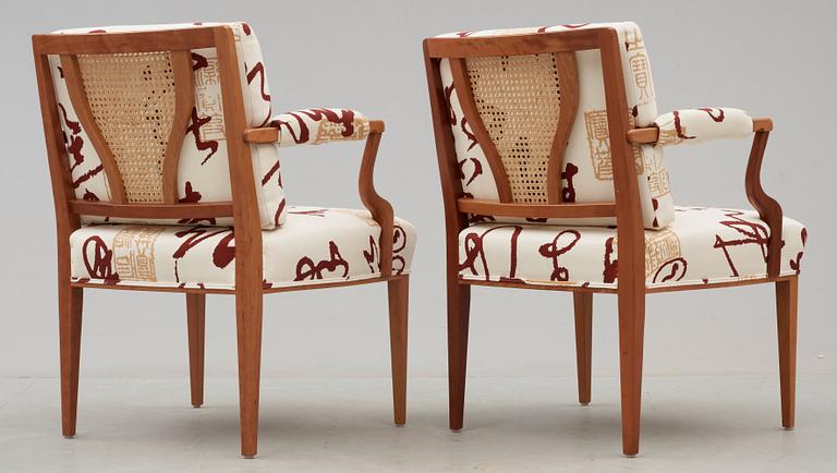 A pair of Josef Frank cherry and rattan armchairs, Svenskt Tenn, model 969.