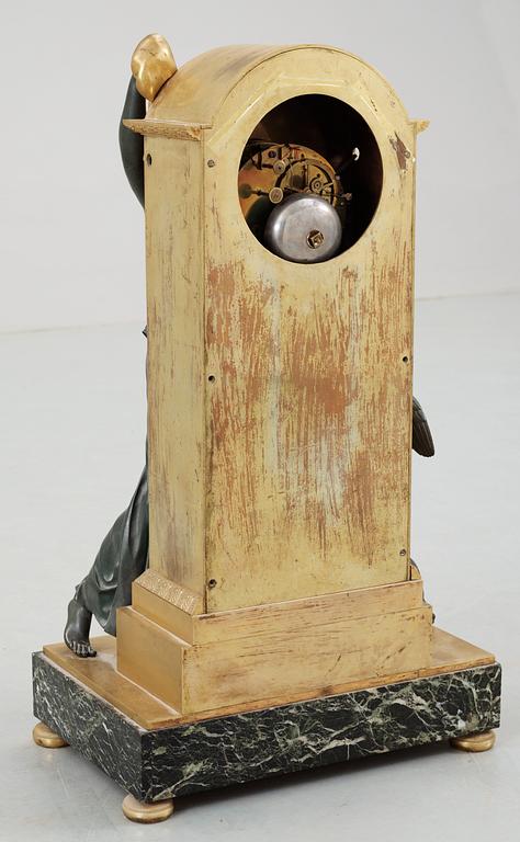 A French Empire early 19th Century mantel clock, "Amitié cachant les Heures", by Antoine André Ravrio and Porchez.