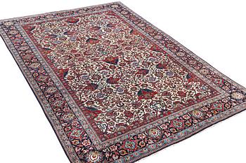 A semi.antique Kashan, c. 319 x 212 cm.