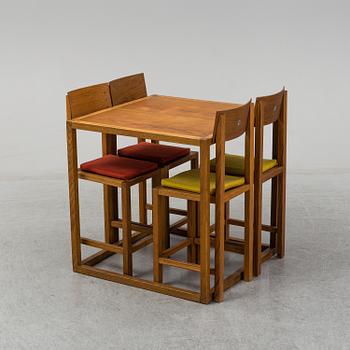 MARIO PRANDINA, an oak table and four chairs, Plinio Il Giovane, Italy.