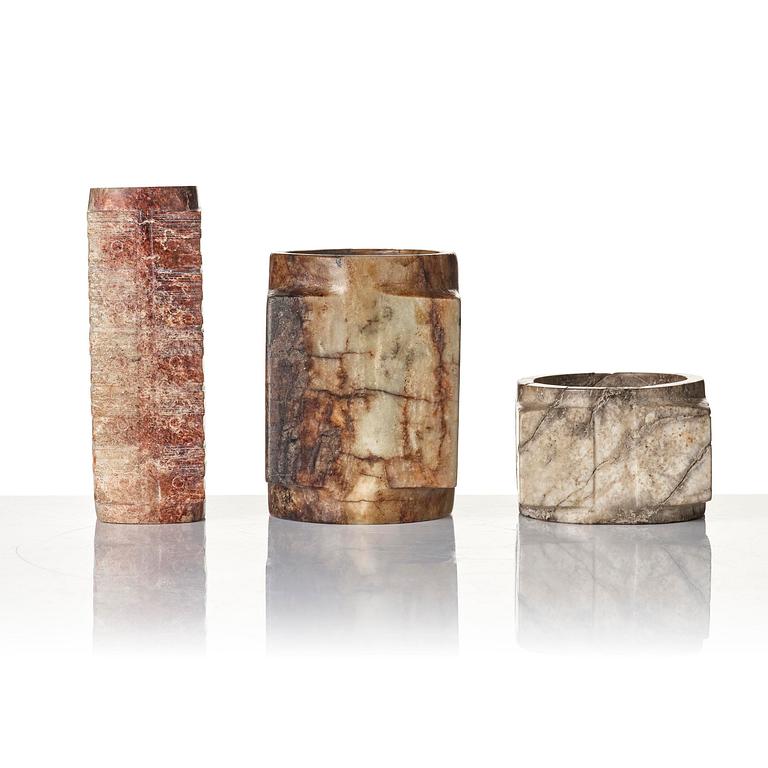 A group of three archaistic stone congs.