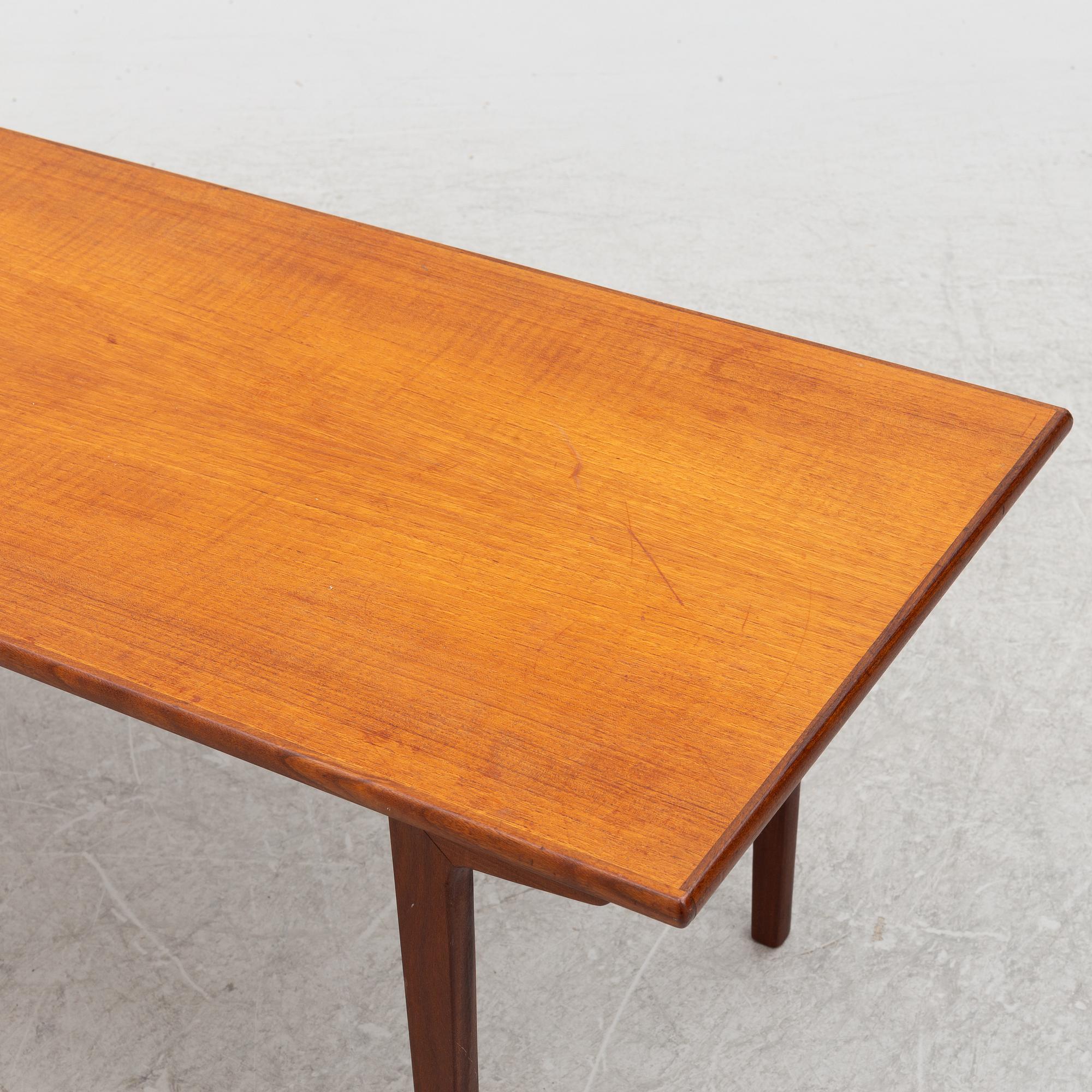 A teak coffee table and two side tables, Scandinavia, 1960's/70's.