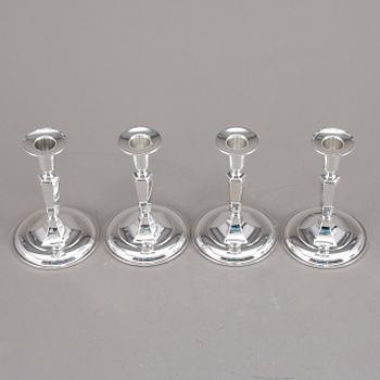 LJUSSTAKAR, 4st snarlika, silver, K&EC, Göteborg, 1956.