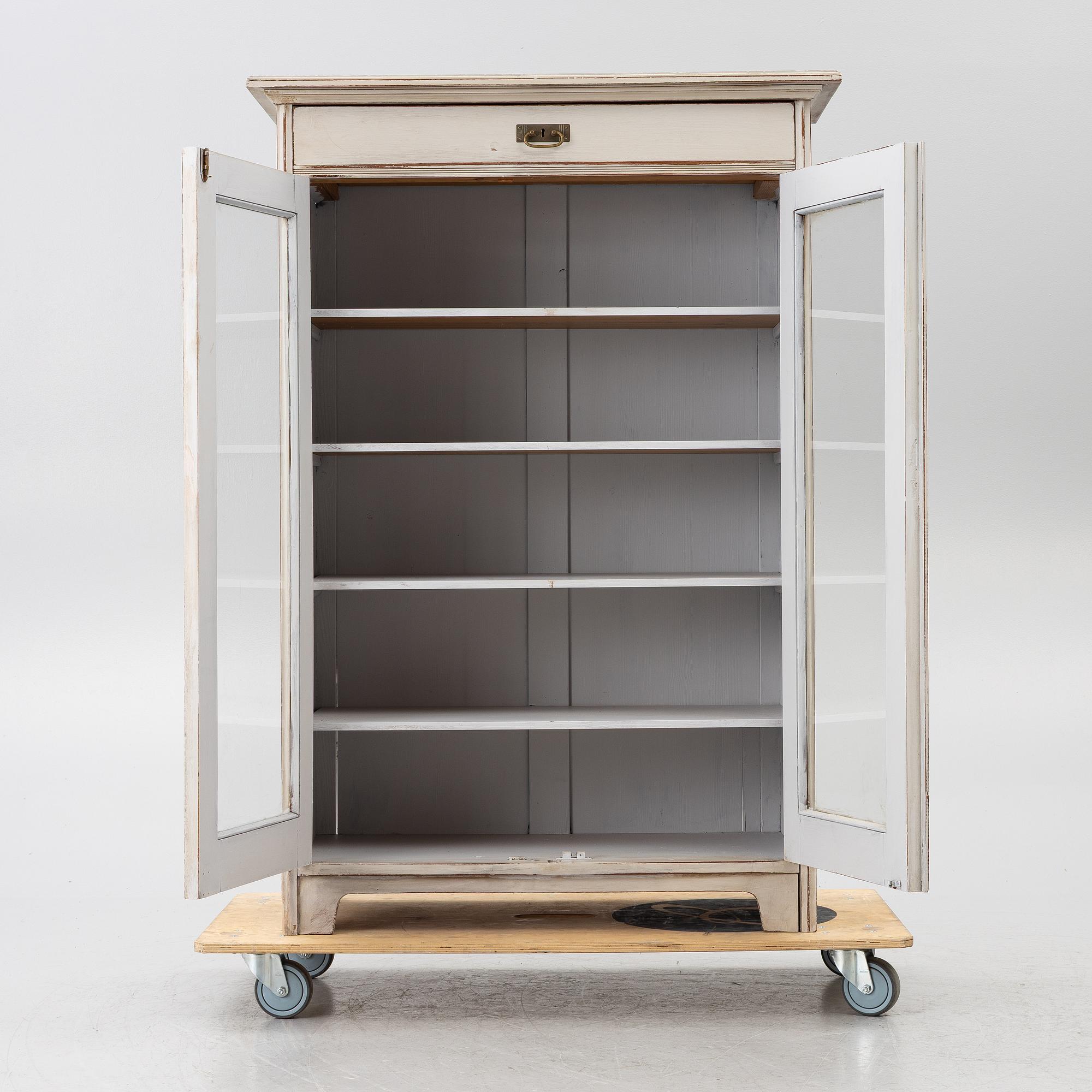 Display cabinet, early 20th century.