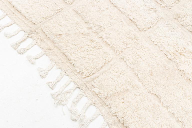 A Moroccan carpet, circa 308 x 181 cm.