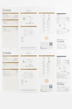Earrings 18K white gold set with oval-cut diamonds, accompanied by GIA report.