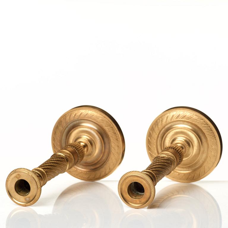 A pair of Empire candlesticks.