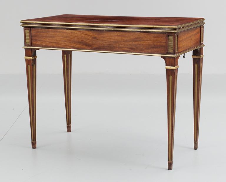 A North European late 18th century mahogany veneered game table.