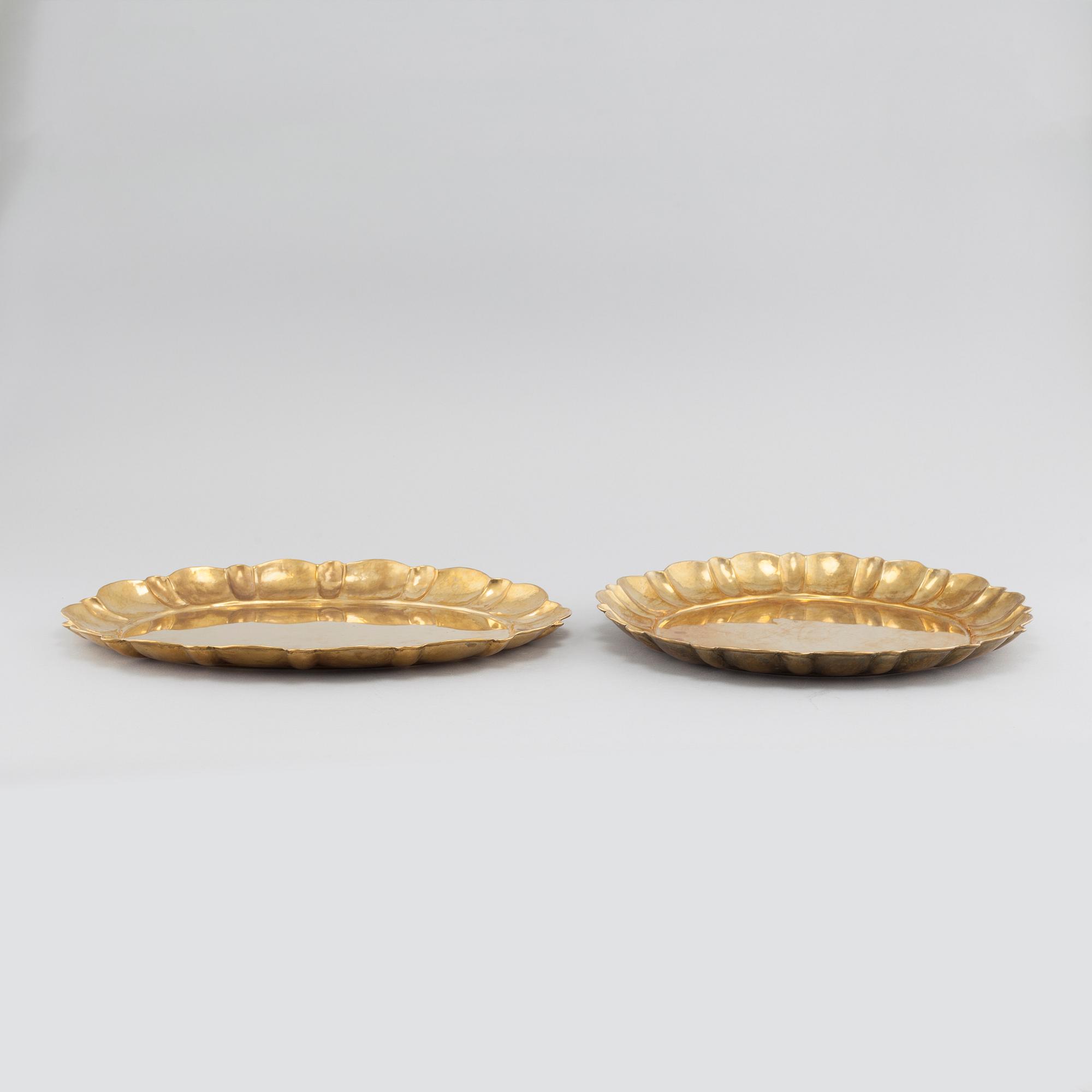 LARS HOLMSTRÖM, two brass trays,
"Firma Lars Holmström Arvika".