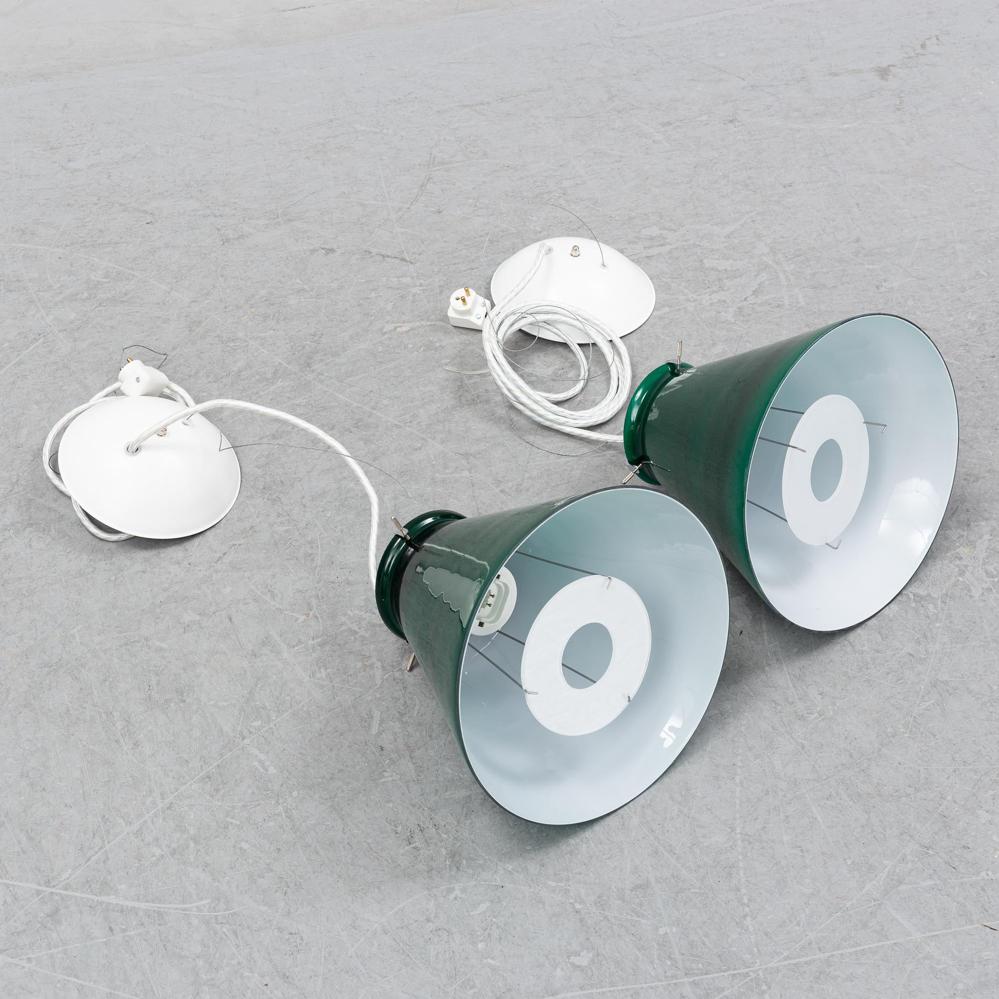 A pair of ceiling lamps in green and white glass, model no 4011, Zero.