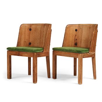 425. Axel Einar Hjorth, a pair of stained pine 'Lovö' chairs, Nordiska Kompaniet Sweden 1930s.