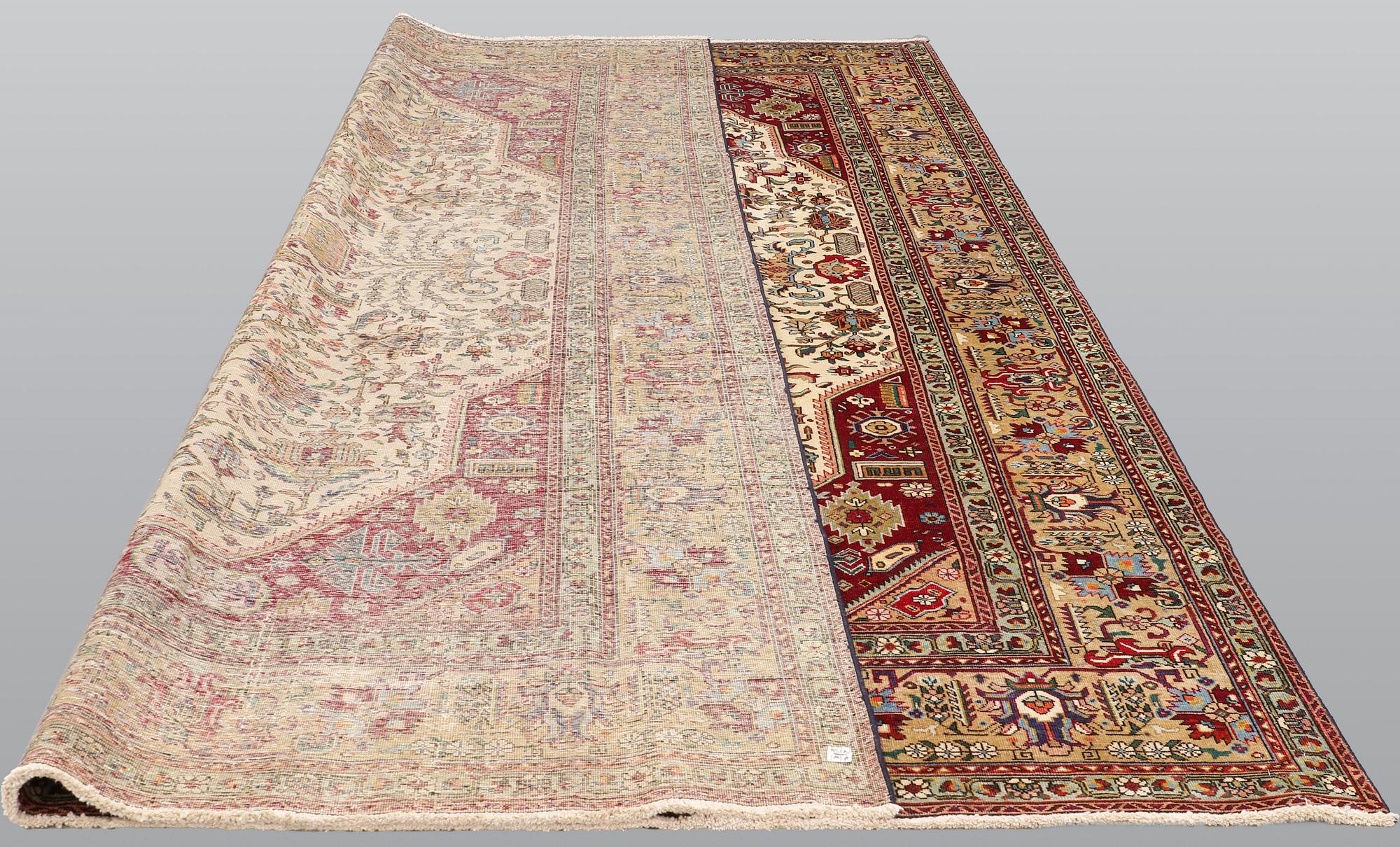 A carpet, Tabriz, ca 392 x 291 cm.