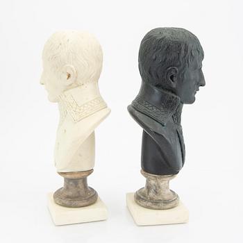 A pair of modern plaster statues of Napoleon.